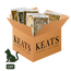 An open tan cardboard box labeled KEATS Gourmet Pet Food, filled with several cat food pouches and bags. A dark green cat silhouette and the word CAT appear in the lower left on a white background.